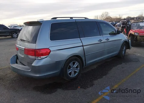 2009 Honda Odyssey Touring z USA, uszkodzony, nr VIN 5FNRL38959B020293